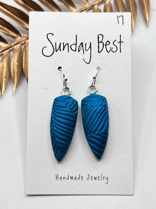 Turquoise Puffy Leaf Impression Dangles